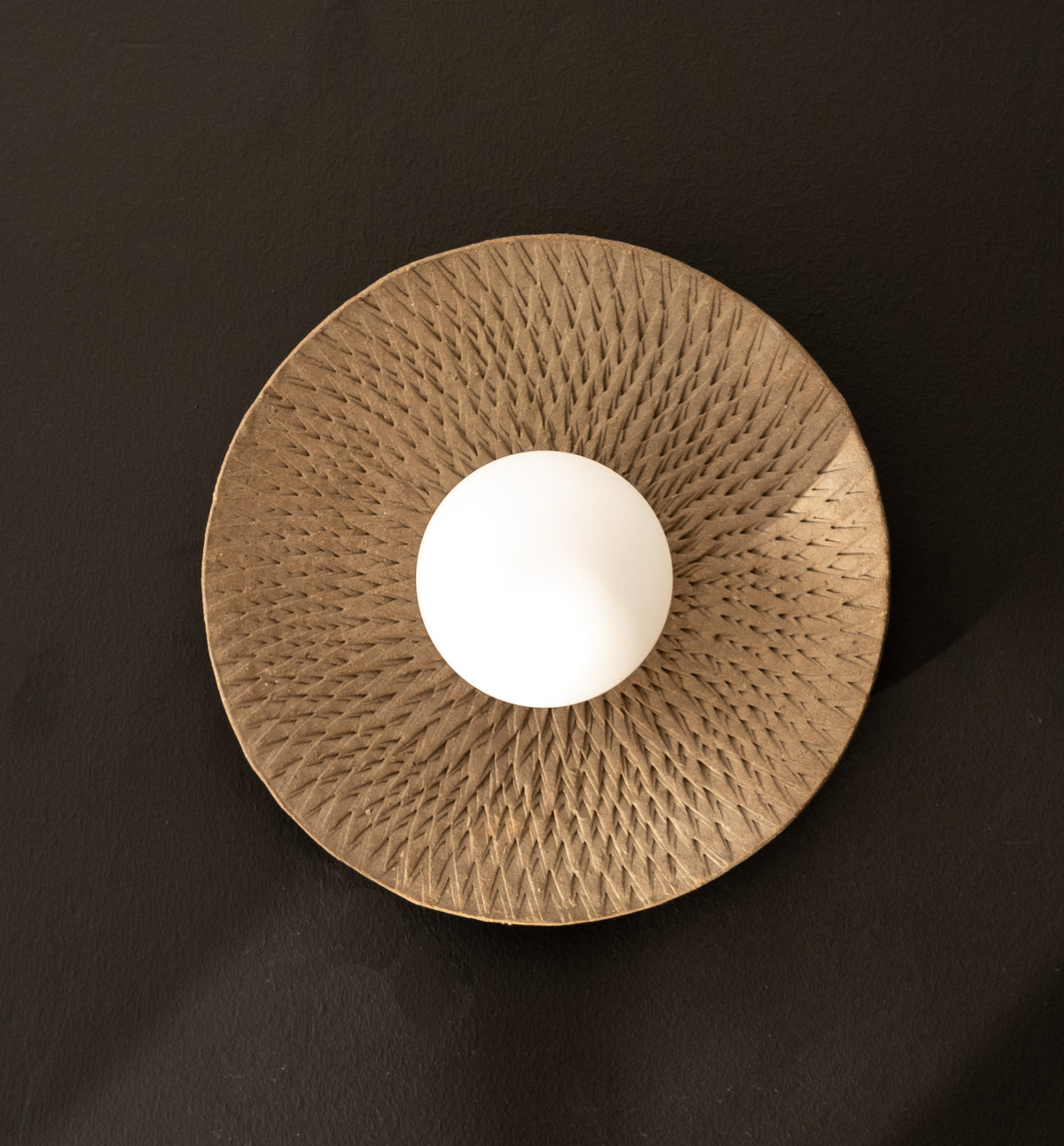Neris – handmade grey ceramic wall sconce in natural stoneware clay by Geza Ceramic Studio