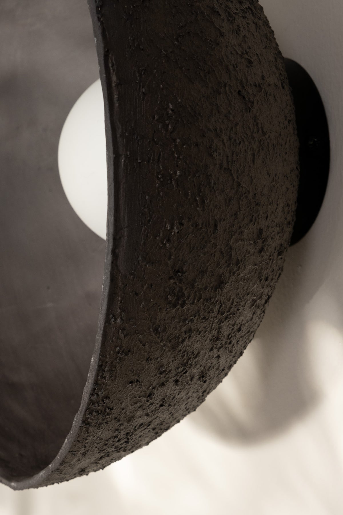Astra – handmade black ceramic wall sconce in natural clay, Geza Ceramic – image 9