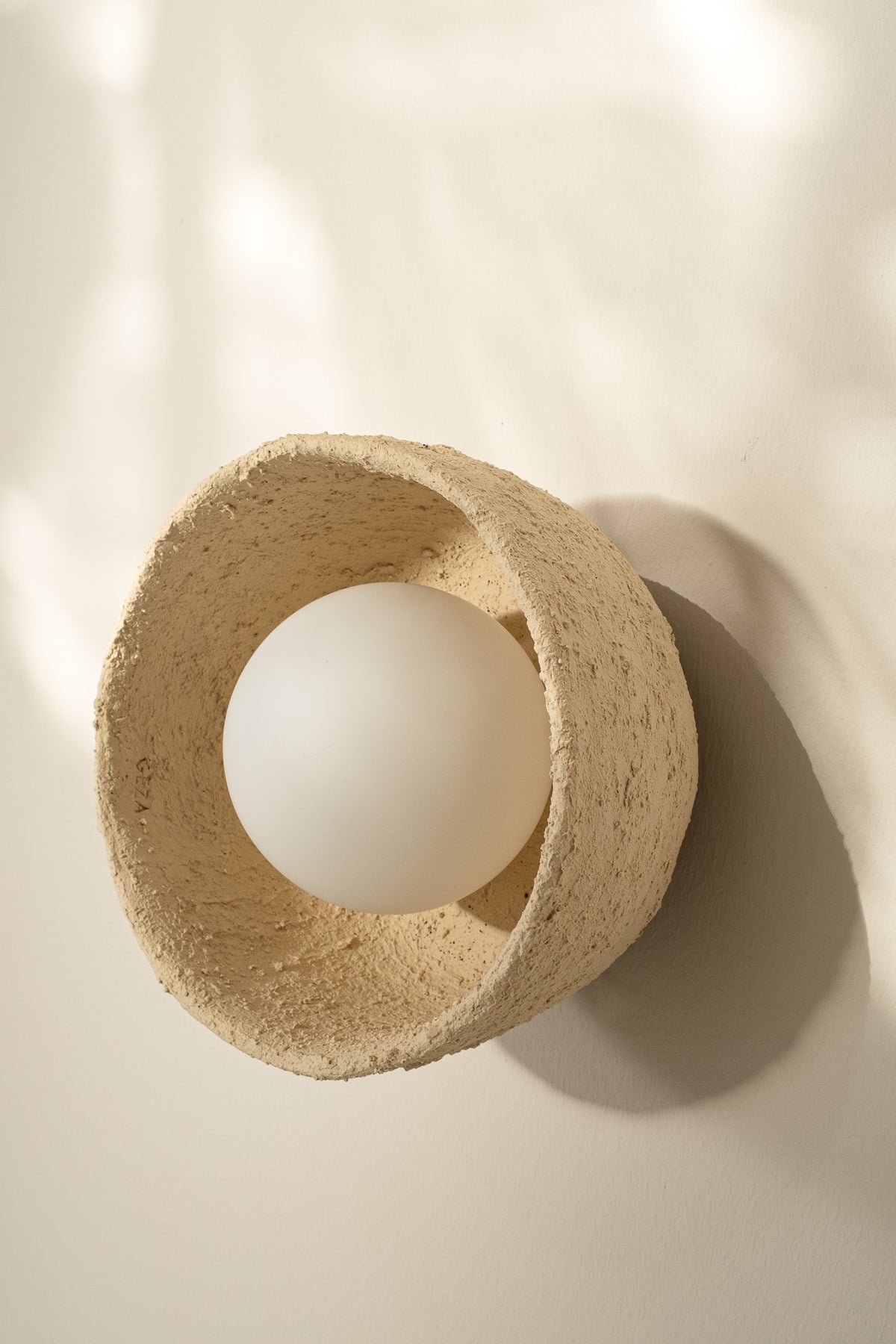 Lunor – handmade beige ceramic wall sconce in natural stoneware clay by Geza Ceramic Studio