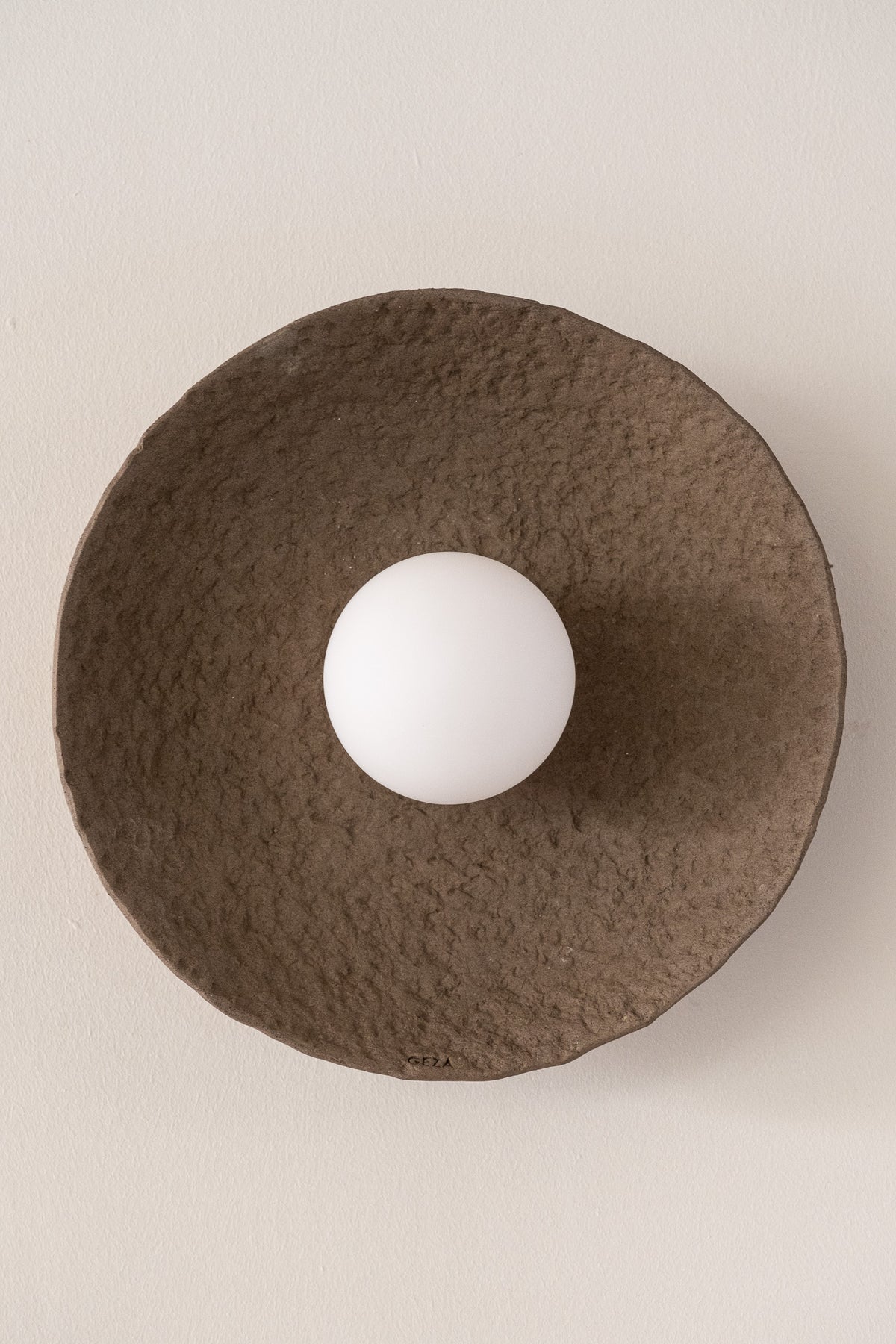 Eido – handmade brown ceramic wall sconce in natural stoneware clay by Geza Ceramic Studio