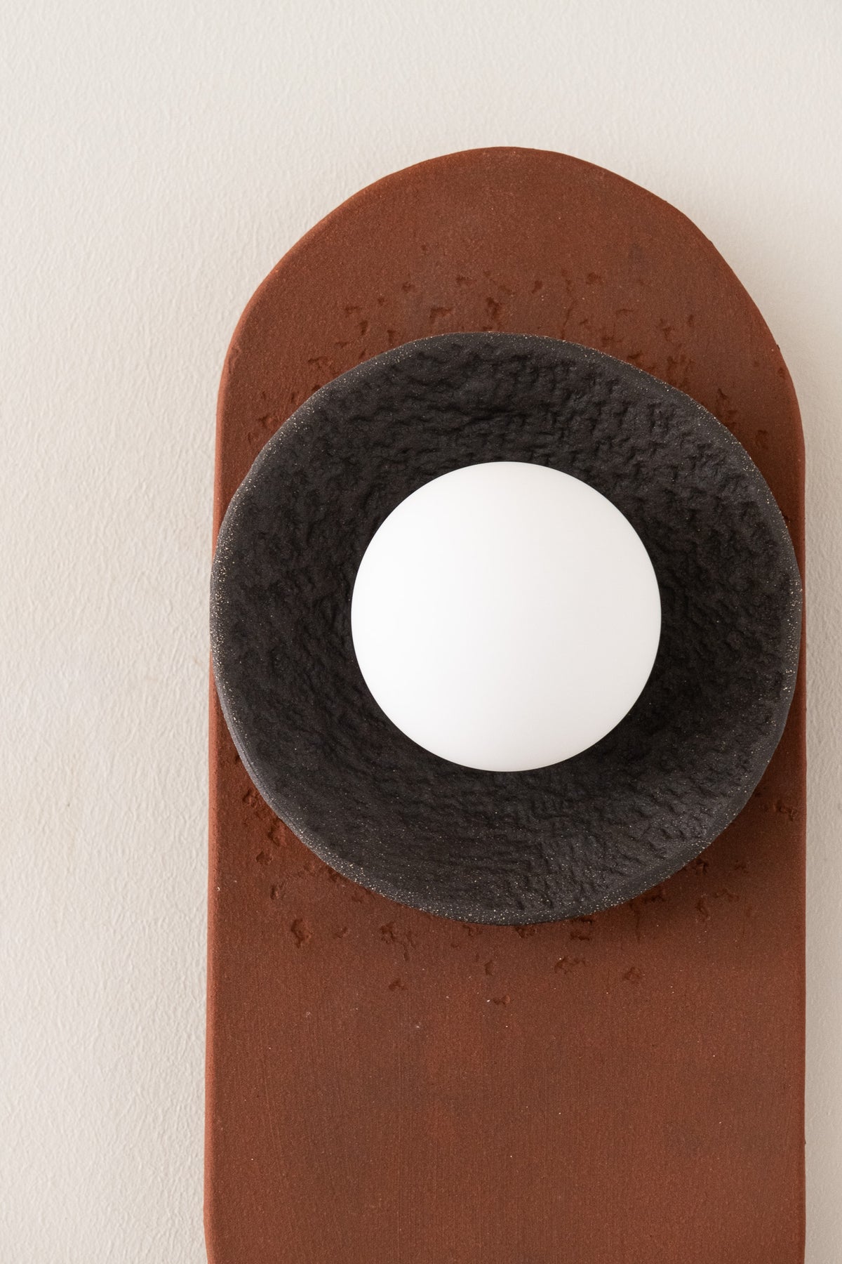 Nami – handmade terracotta & black ceramic wall sconce in natural clay, Geza Ceramic – image 9