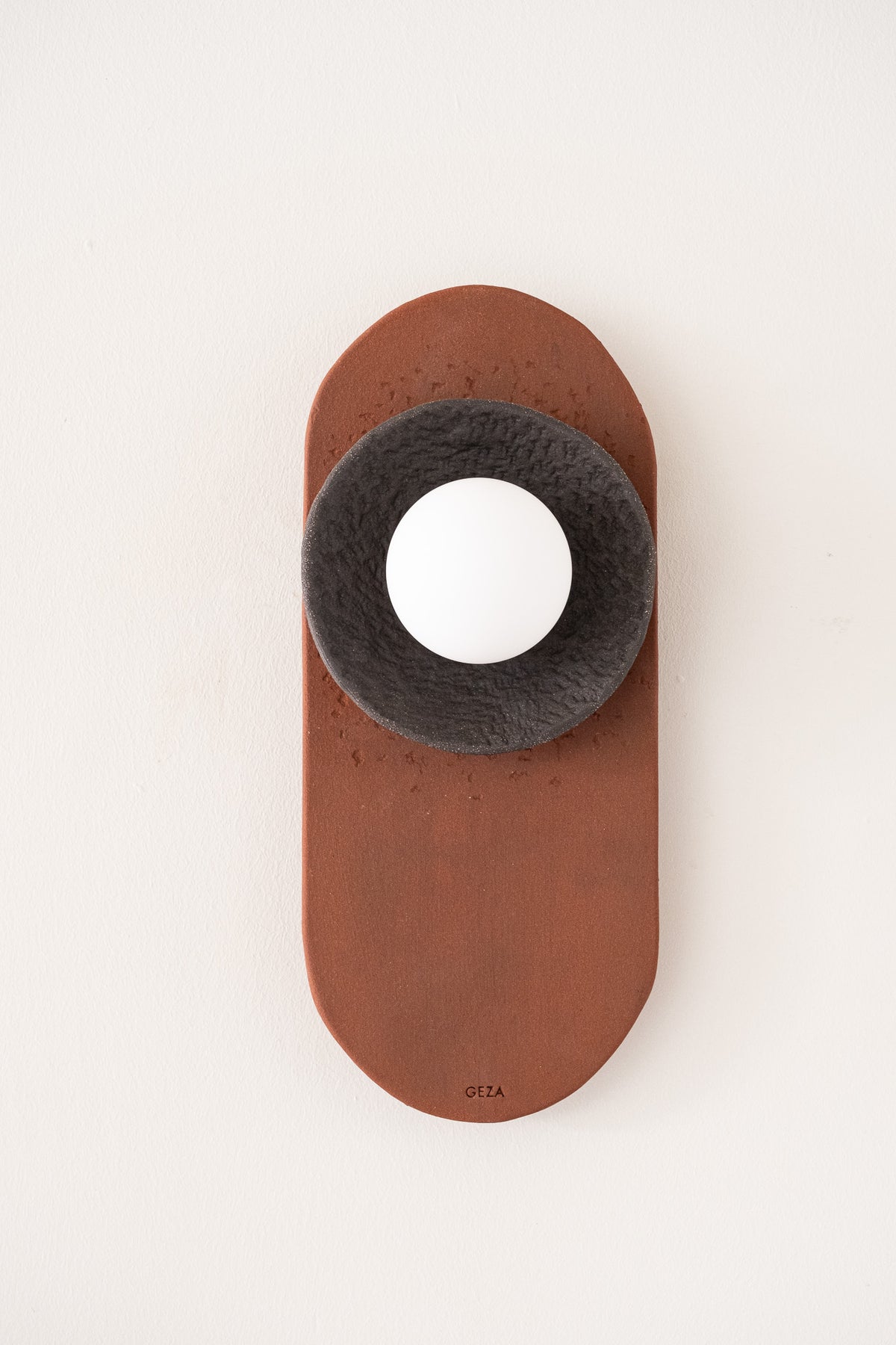 Nami – handmade terracotta & black ceramic wall sconce in natural clay, Geza Ceramic – image 7