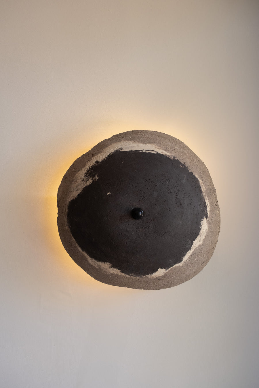 Niveo – handmade black & white ceramic wall sconce in natural stoneware clay by Geza Ceramic Studio