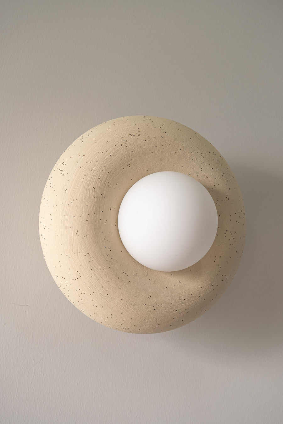 Ariadne – handmade ceramic wall sconce in natural stoneware clay by Geza Ceramic Studio